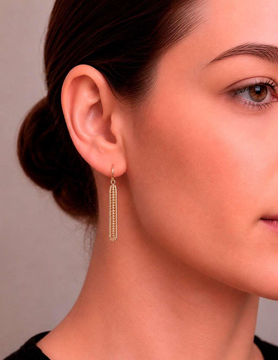 Aretes largos ovalados acabado chapa de oro zirconia